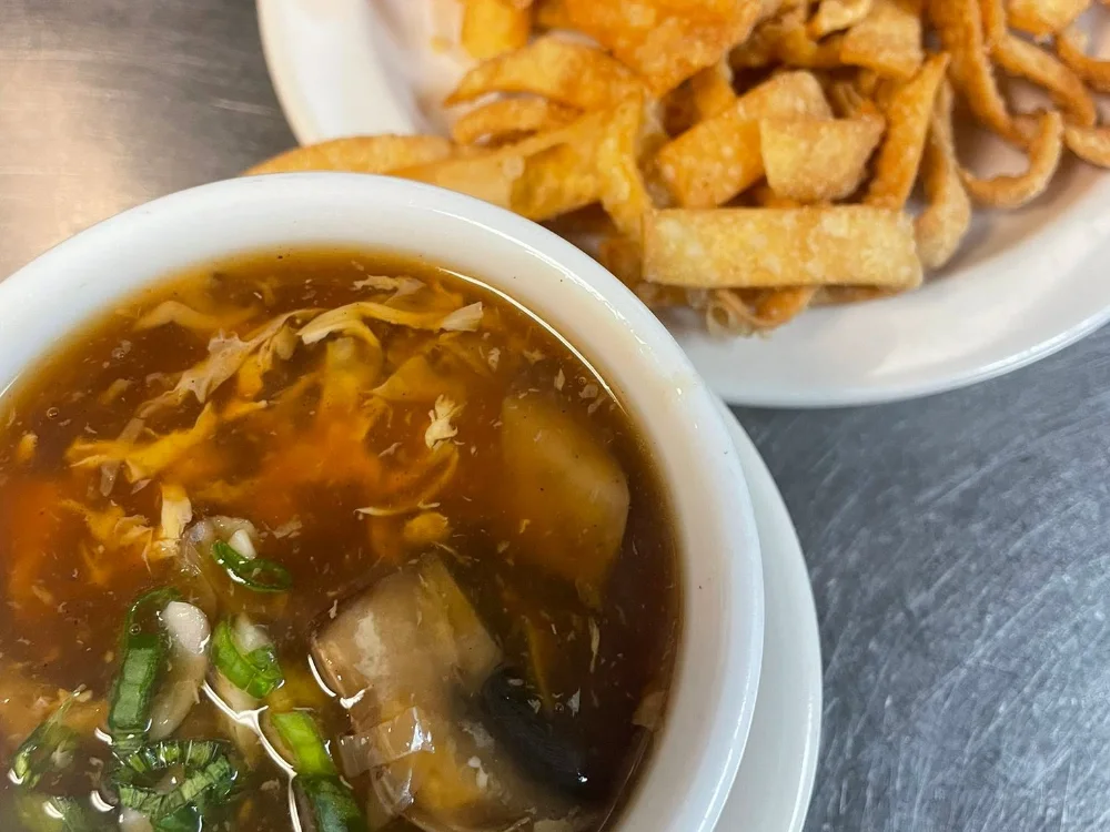 Hot and sour soup with a side of crispy noodles at Shanghai Town